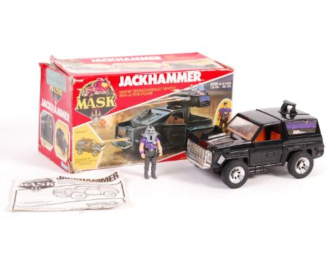 An original vintage 1980's Kenner made MASK action figure playset ' Jackhammer '. Appears complete, including the Cliff Dagge