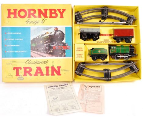 An original vintage Hornby 0 Gauge Clockwork Train set ' No. 30 Goods Set '. Contents themselves appear in near mint conditio