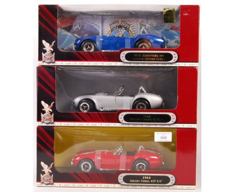 A collection of 3x Road Signature 1:18 scale precision diecast models - all Cobras - to include; 1964 Shelby Cobra (one red, 