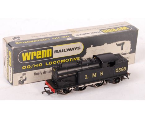 An original vintage Wrenn made 00 gauge railway trainset locomotive W2215 / 2215 ' 2385 0-6-2 ' locomotive. BR, black. Within