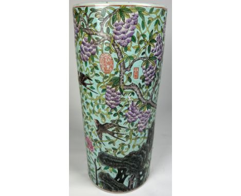 A LARGE CHINESE CERAMIC UMBRELLA STAND, painted with imagery of grapes, vine leaves and flowers.No base.**Please note that th