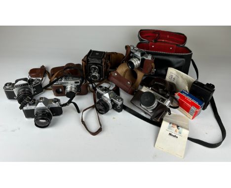 A COLLECTION OF CAMERAS, to include various makes such as Minolta, Olympus, Pentax etc. Some cased. **Please note that this l