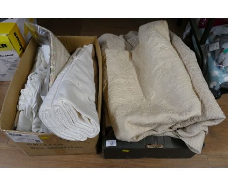 Two boxes of sheets, embroidered pieces and quilt