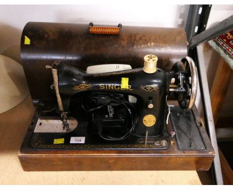 Cased singer electric sewing machine