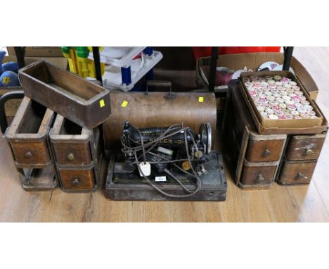 Cased Singer electric sewing machine and sewing drawers