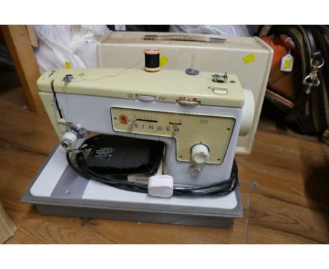 Cased electric Singer sewing machine Model 413