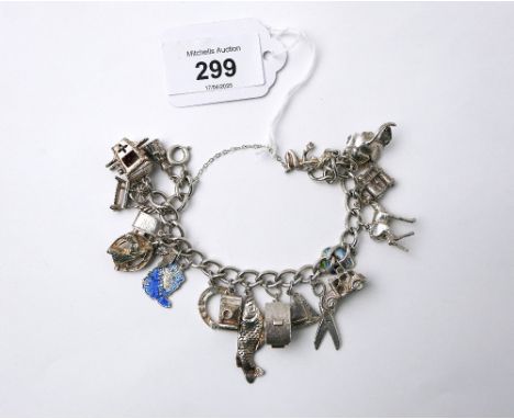 White metal and silver charm bracelet with charms