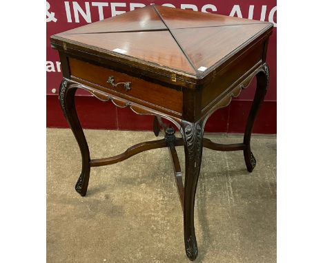 An Edward VII mahogany envelope card table 
