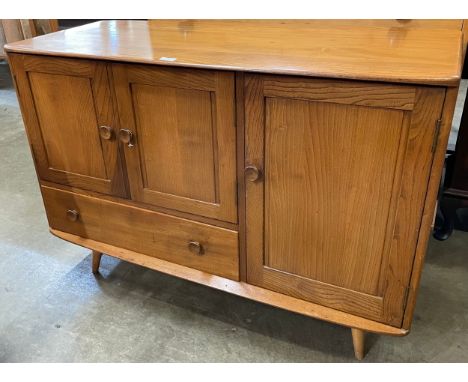 An Ercol Golden Dawn elm sideboard 