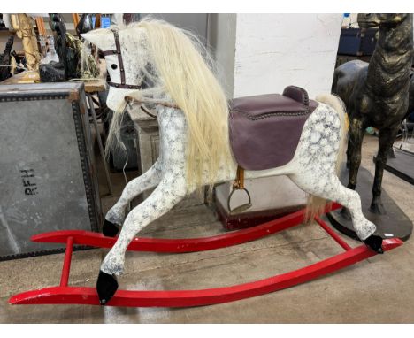 An early 20th Century French painted rocking horse 