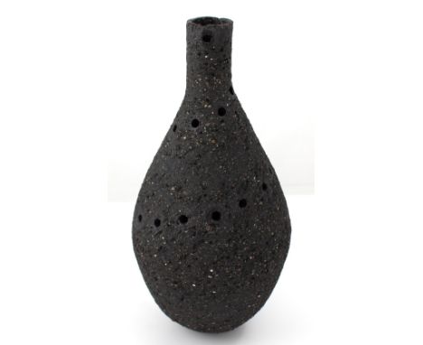 Louise Waller; a black grogged stoneware hand-built vase with pierced decoration, height approx 33cm. https://www.instagram.c