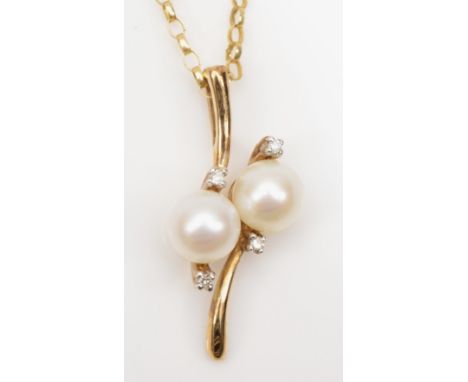 A 9ct gold cultured pearl and eight cut diamond pendant, on 375 chain, 22mm, 2.1gm. 