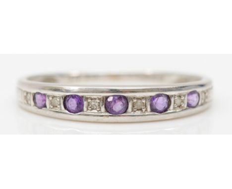 A 9ct white gold amethyst and eight cut diamond dress ring, Q-R, 1.3gm. 