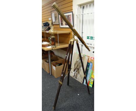 A vintage telescope on a tripod stand Condition reports are provided on request by email only for this type of auction, other