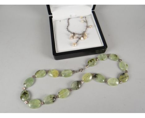 A seed pearl droplet necklace and a possibly green-jade and silver bead necklet