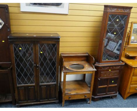 A carved &amp; glazed corner cupboard, an antique wash basin stand &amp; a glazed and linenfold bookcase Condition reports ar