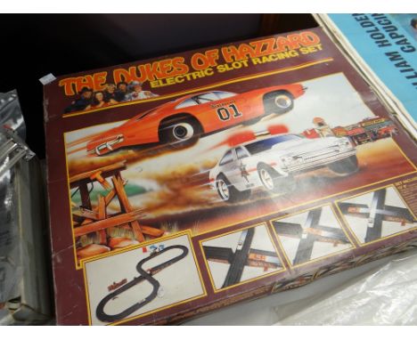 A Dukes of Hazzard Electric Slot Racing set in original box Condition reports are provided on request by email only for this 