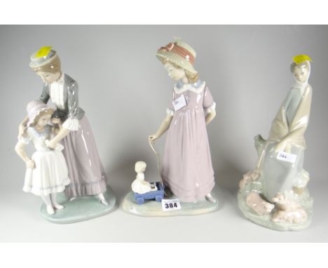 Two Lladro &amp; a Nao figurine Condition reports are provided on request by email only for this type of auction, otherwise p