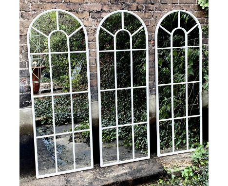 ARCHITECTURAL GARDEN MIRRORS, a set of three, regency style, painted metal frames with overlaid detail, 170x60. (3) 