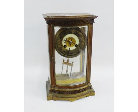 19th century brass and glass cased mantle clock with a silvered chapter ring and Arabic numerals and a mercury pendulum, with