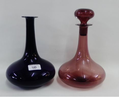 Early 19th century amethyst carafe, together with a late 19th century amethyst glass decanter and stopper, tallest 25cm high,