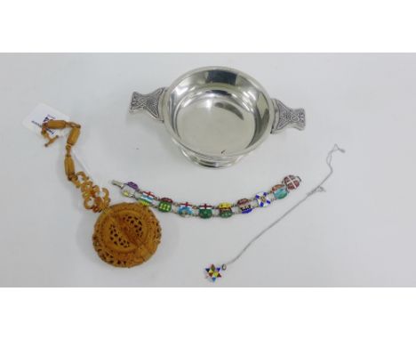 Mixed lot to include a Sterling silver and enamel bracelet, pewter quaich and a carved wooden castle (3) 