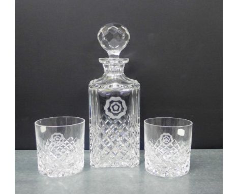 Spirit decanter and stopper, together with a set of six whisky tumblers, each with etched 'Tudor Rose' pattern, boxed