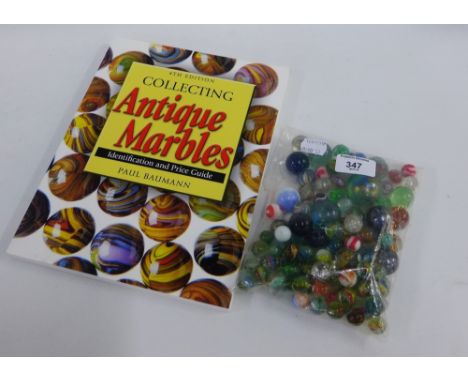 Collection of vintage marbles, together with Collecting Antique Marbles, IV Edition by Paul Bowman, an Identification and pri