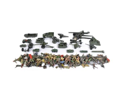 A collection of vintage Britain's and Lone Star military diecast figures along with a selection of plastic soldier figures. D