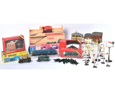 A collection of assorted OO gauge model railway trainset locomotive engine and trackside accessories, from various makers, to