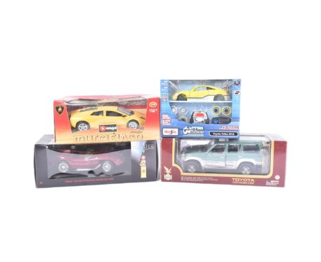 Diecast - a collection of x4 assorted 1/18 scale diecast model cars comprising; Burago Lamborghini Murcielago, Classico Ferra