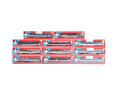A collection of x11 Lima OO gauge model railway trainset locomotive rolling stock coaches / carriages, comprising of x4 Netwo