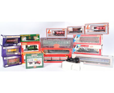 A collection of assorted OO gauge model railway trainset locomotives, wagons and coaches from various makers, to include Horn