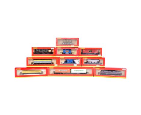 A collection of assorted OO gauge model railway trainset locomotive rolling stock wagons, vans and containers. Boxed examples
