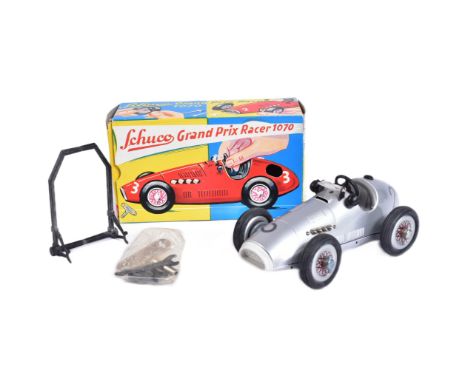 Clockwork Car - a vintage German Schuco made tinplate clockwork model 1070 Grand Prix Racer. Silver body with original key, t