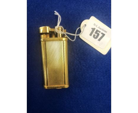 A gold plated Dunhill unique lighter