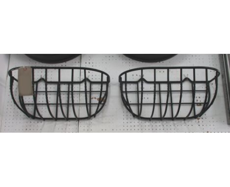 WALL PLANT HOLDERS, a pair, in black metal stable trough style, 53cm x 23cm x 23cm H plus a window box in aluminium black fin