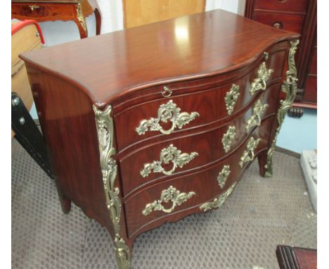 RALPH LAUREN COMMODE, with three drawers below with slide and brass mounts, 117cm x 58cm x 86cm H.