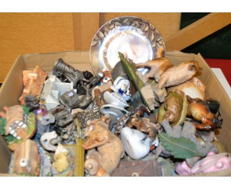 A set of pewter magic and mystery type figures, with crystal, wizard, unicorn; Wade; miniature cottages; animal models; a flo