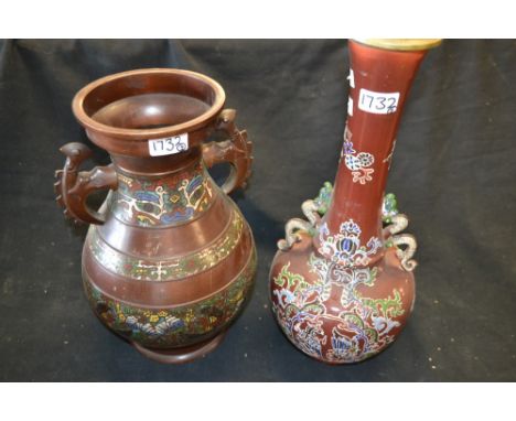 A Japanese bronzed two handled vase, inlaid with cloisonne bands, 37cm high, early 20th century; a Japanese bottle vase table