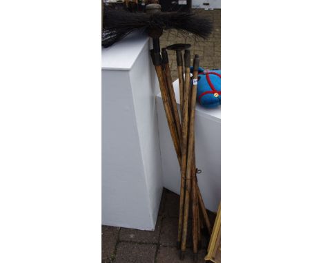 A early 20th century 10 section chimney sweep set.