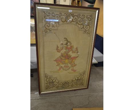 An Indonesian wall hanging tapestry, embroidered and sequined image of a Masked Dancer, 108 x 68cm, framed  **All lots in thi