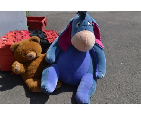 A large Disney Eyore soft toy; a large cuddly teddy bear (2)  **All lots in this sale are subject to a maximum of £2.50 plus 