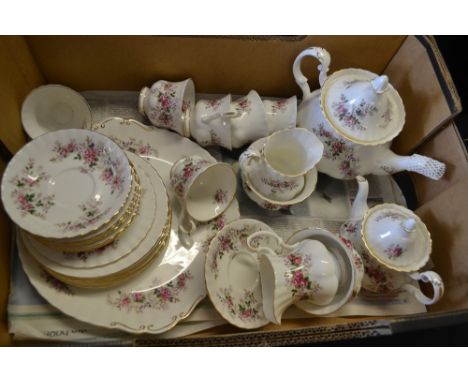 A Royal Albert Lavender Rose six-setting tea service, comprising tea pot, covered hot water pot, milk jug, sugar basin, bread