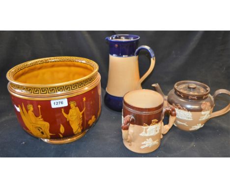  A Doulton Lambeth stoneware tyg, applied with hunting and tavern scenes, impressed marks, c.1900; a conforming Royal Doulton