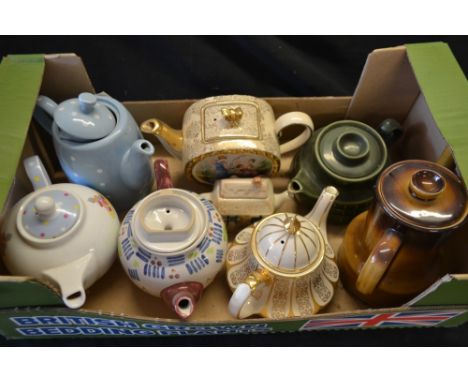 Tea Ware - a Crinoline Ladies teapot; others tea pots, including novelties; a set of three Royal Grafton tea cups and saucers