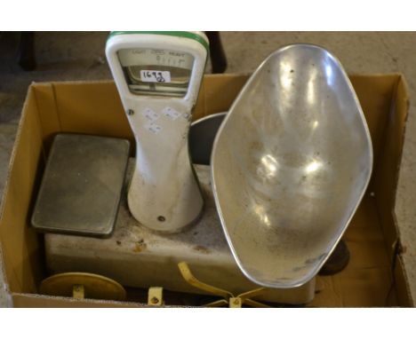 A pair of mid 20th century shop balance scales; a pair of kitchen balance scales, a set of graduated metal weights  **All lot