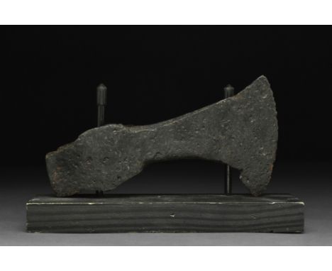 Ca. 900-1100 AD.An iron battle axe with a flaring blade, tapering cheek, heavy poll and a socket. For more information on Vik