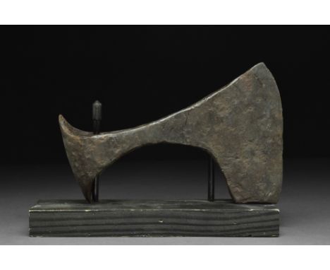 Ca. 900-1100 AD.A hand-forged, iron axehead with substantial curved blade and elliptical shaft-hole. The profile is square at