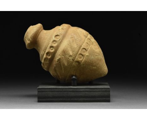 Ca. 900-1200 AD.A "Greek Fire" hand grenade comprising a cream ceramic vessel with a spheroconical body, and a short, squat n